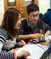 Image of students in the lab using state-of-the-art measuring and testing equipment